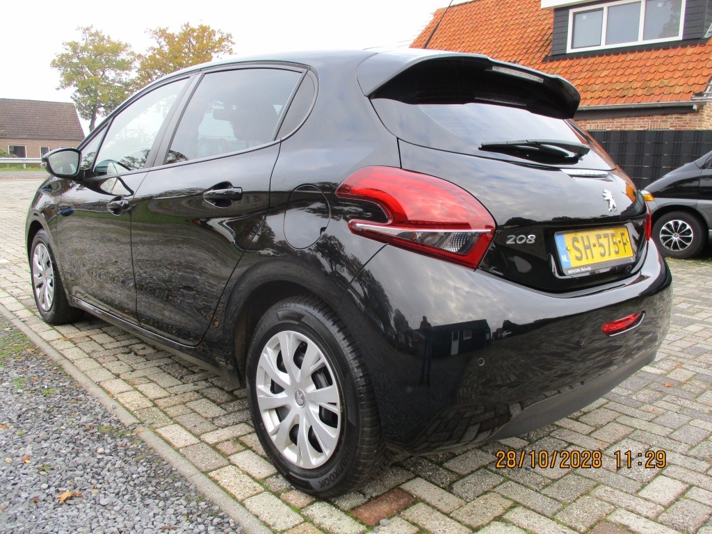 Peugeot 208 1.2 PureT. Blue Lion foto's
