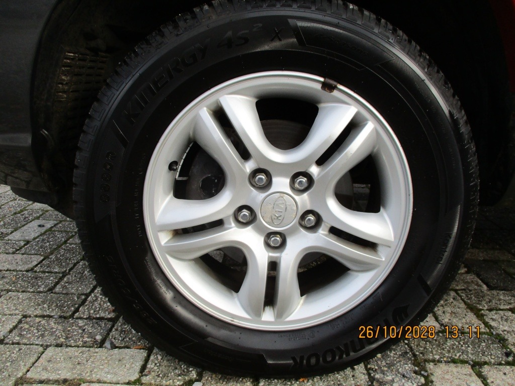 Kia Sportage 2.0 CVVT Executive foto's